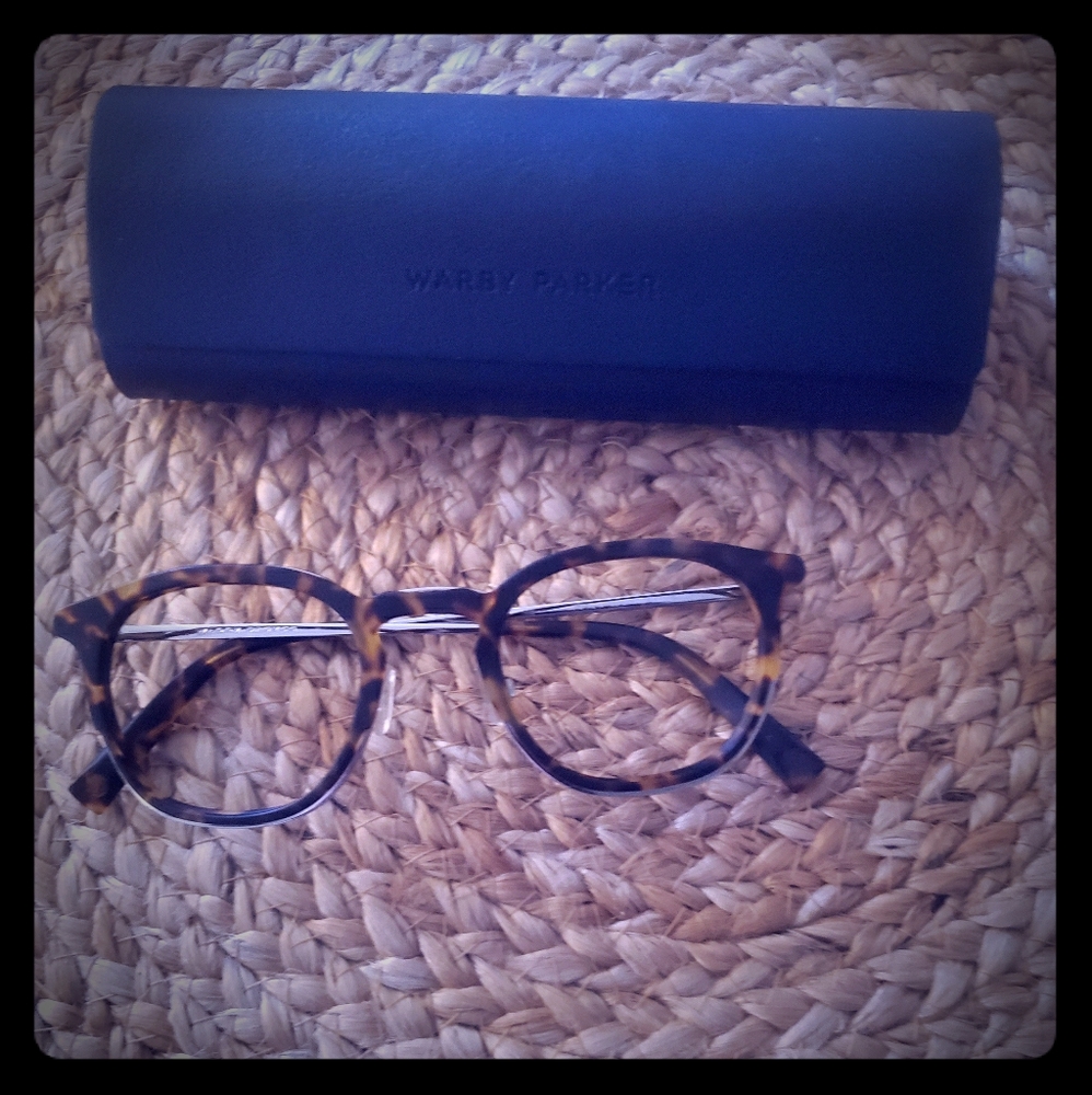 Warby Parker frames with tortoise and gold trim